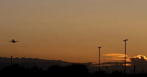 Aircraft Taking Off At Sunset Stock Footage 119909968