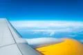 The aircraft wing on the background of cloud Photo