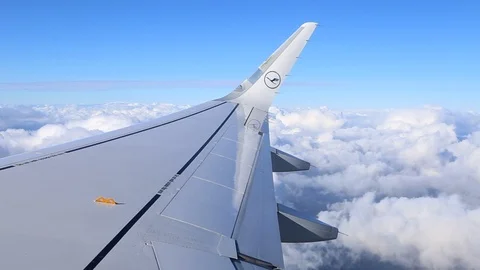 Aircraft wing flying through clouds Stock Footage 103172641