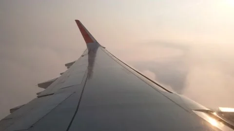 Aircraft wing view. Flying through dramatic clouds. Stock Footage 133155155