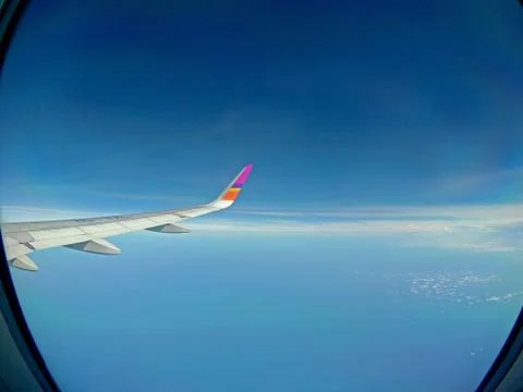 Aircraft Wing,View of a plane while flying in the sky Stock Photos