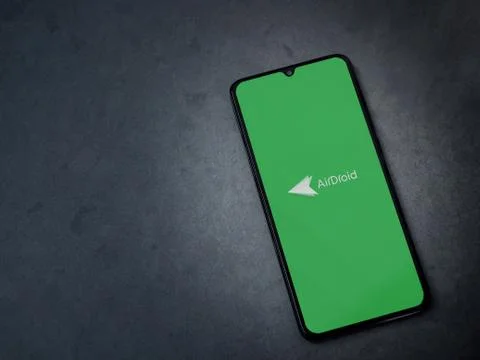 AirDroid app launch screen with logo on the display of a black mobile smartph Stock Photos