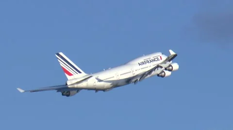 AirFrance Boeing 747 jumbo jet climbs skyward Stock Footage