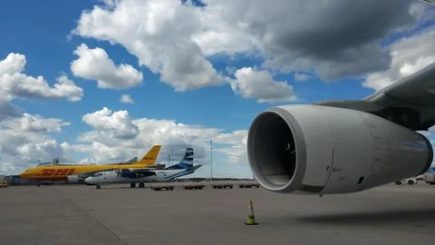 Airline, cargo offloading operation Stock Photos