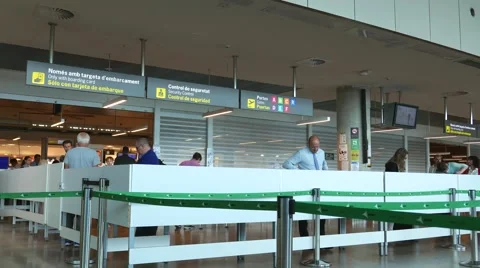Airline passengers checking in at the Security Line Stock Footage 63075633