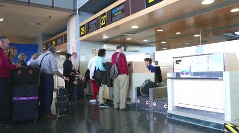 Airline passengers checking in at the Valencia, Spain Airport Stock Footage 62750690