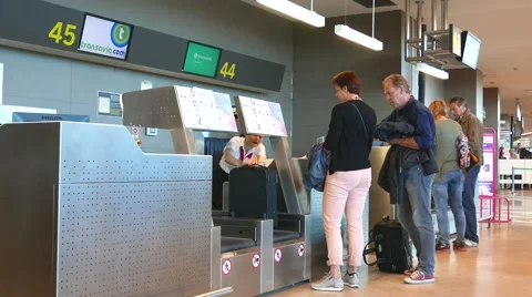 Airline passengers checking in at the Valencia, Spain Airport Stock-Footage 62751402