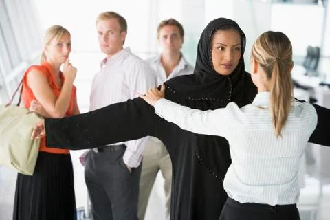 Airline passengers undergoing a security check Stock Photos