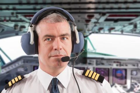 Airline pilot on board Stock Photos