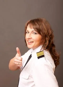 Airline pilot thumb up Stock Photos
