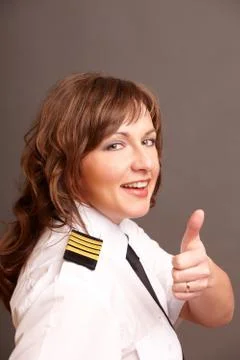 Airline pilot thumb up Stock Photos