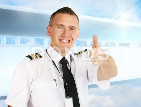 Airline pilot thumb up Stock Photos