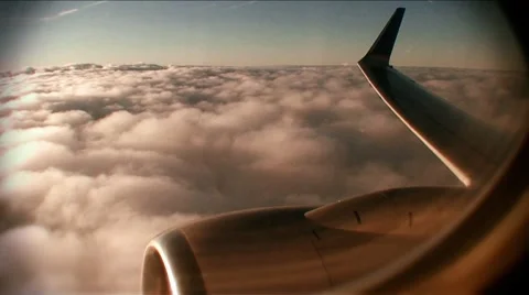 Airline-wing-clouds Stockbeeldmateriaal 1008011