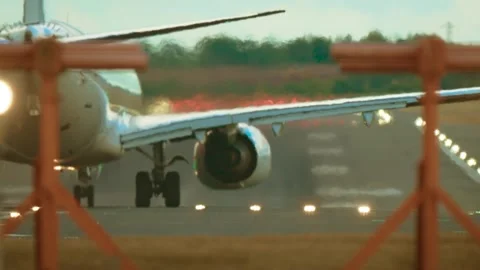 Airliner accelerating on runway during takeoff roll. Jet speeding along landing Stock Footage 323592932