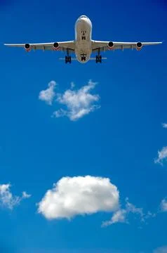 Airliner and cloud Stock Photos