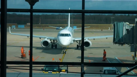 Airliner Arriving At The Gate Stock Footage 104522640