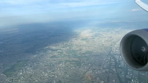 Airliner Engine View Over Tokyo Suburbs   Stock Footage 336816539