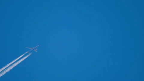 Airliner flying in the blue sky Stock Footage 158586985