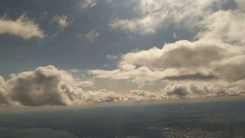 Airliner Flying Just Below Clouds Stock Footage 78605035