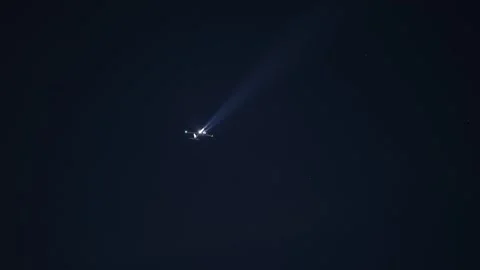 Airliner jet aircraft arriving at international airport at night Stock Footage 246670894