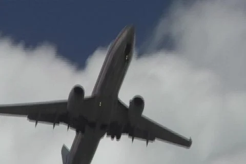 Airliner - Jetliner from down below Stock Footage 877452
