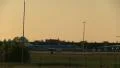 Airliner landing at dusk HD Footage