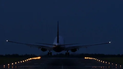 Airliner landing in the night, 4k Stock Footage