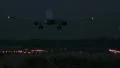 Airliner landing at night HD Footage