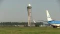 Airliner passing Air Traffic Control tower HD Footage