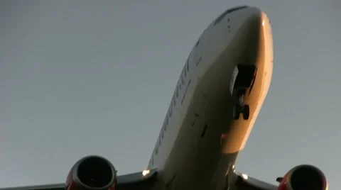 Airliner passing overhead Stock Footage