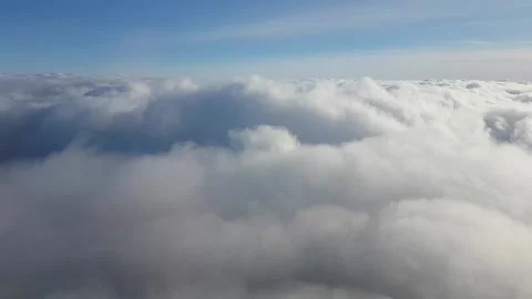 Airliner surfing and going through white clouds Stock Footage 224937418