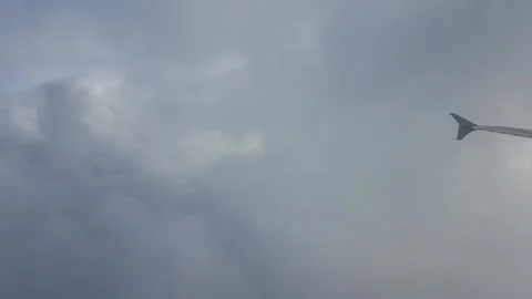 Airliner surfing on clouds Stock Footage 224937314