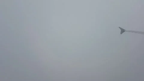 Airliner surfing into stratus clouds Stock Footage 224937341