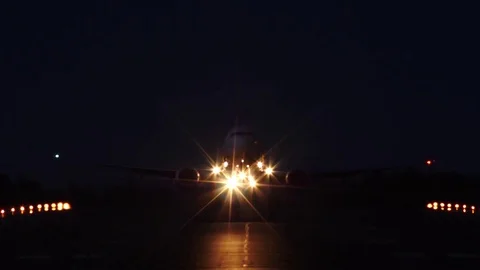 Airliner taking off, night Stock Footage