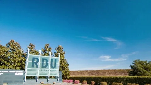 Airliner Taking-off Over Raleigh-Durham International Airport RDU Entrance Stock Footage 69232103