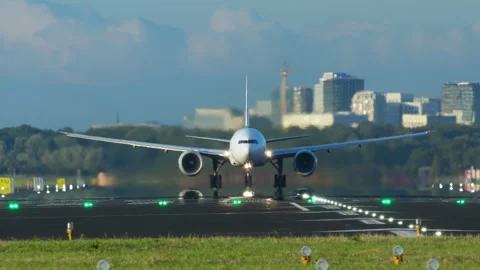 Airliner taking off from runway front view Stock Footage 288709711