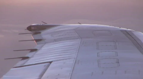 Airliner wing at sunset Stock Footage 314809