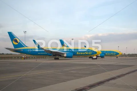 Airliners Grounded at Airport Stock Photos