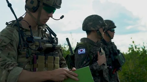 Airman consults notebook during close air support exercise for Red Flag Vídeos de archivo 110732518