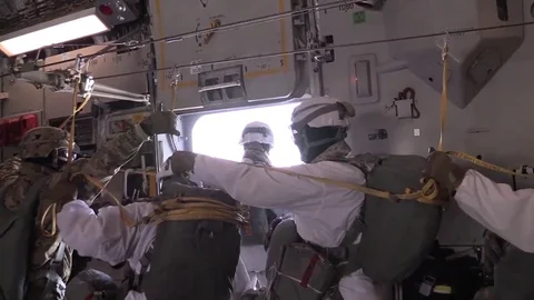Airman jumps off during free-fall parachute jump from aircraft - 2017 Video stock 84951041
