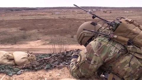 Airman lying down during Close Air Support Training  Stock Footage 83646175