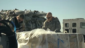 Airmen checking pallet delivery during Cargo Deployment Function Stock Footage 85840402