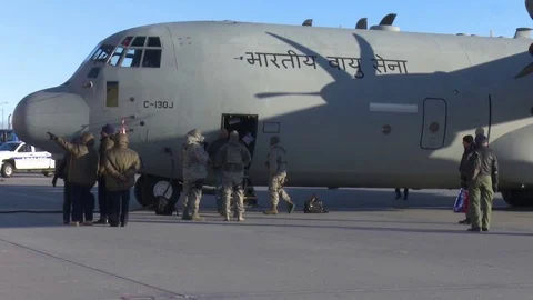 Airmen standing close to Indian C-130 Hercules at Grand Forks Air Force Base Stock Footage 84732070