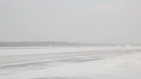 Airplain take off  in winter Stock Footage 60129484