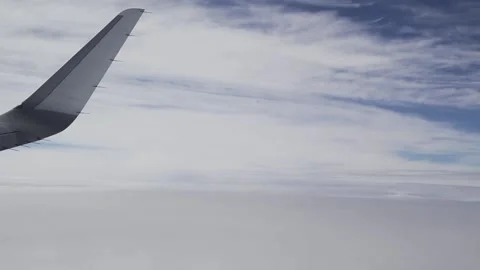 Airplane above the clouds Stock Footage 133245396