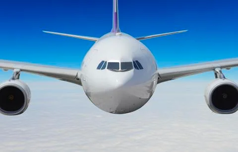 Airplane above the clouds Stock Photos
