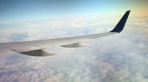 Airplane Above the Clouds: A Soaring Perspective Stock Footage 36270493