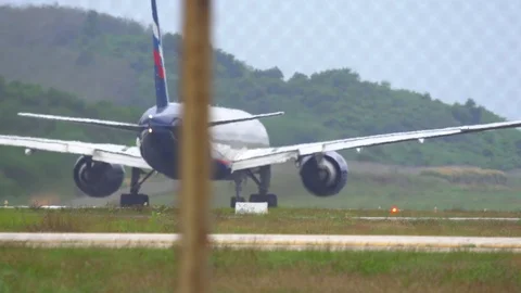 Airplane accelerate before departure Stock Footage 76640021
