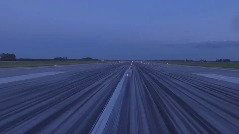 Airplane accelerates over the runway - POV 4K Stock Footage 77712372