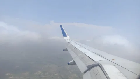 Airplane/ Aeroplane Outside Window View/ Clouds Stock Footage 238855112
